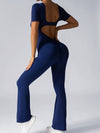 ZASUWA Female Deep V Back Backless Flare Scrunch Bum Jumpsuit