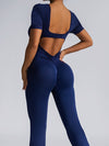 ZASUWA Female Deep V Back Backless Flare Scrunch Bum Jumpsuit