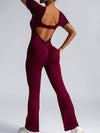 ZASUWA Female Deep V Back Backless Flare Scrunch Bum Jumpsuit