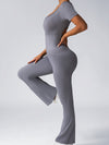 ZASUWA Female Deep V Back Backless Flare Scrunch Bum Jumpsuit