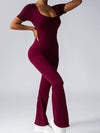 ZASUWA Female Deep V Back Backless Flare Scrunch Bum Jumpsuit