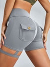 ZASUWA Female Unique Cut Out Pocket Mesh Scrunch Bum Spandex Gym Booty Shorts